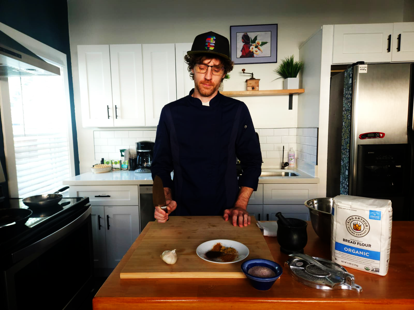 Chef Troy preparing organic ingredients in the kitchen